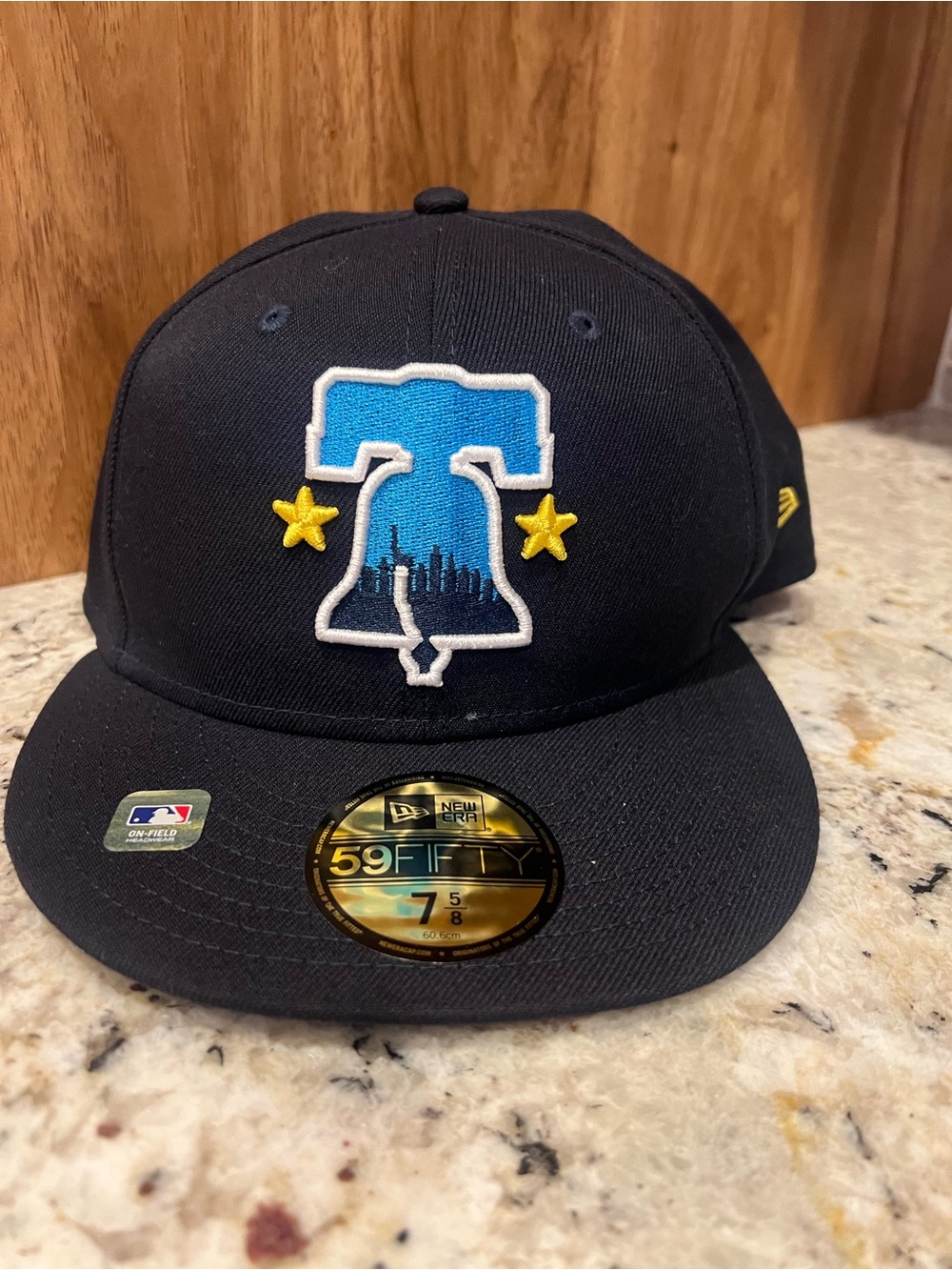 New Era Black Fitted Cap with Blue Liberty Bell Patch and Yellow Stars